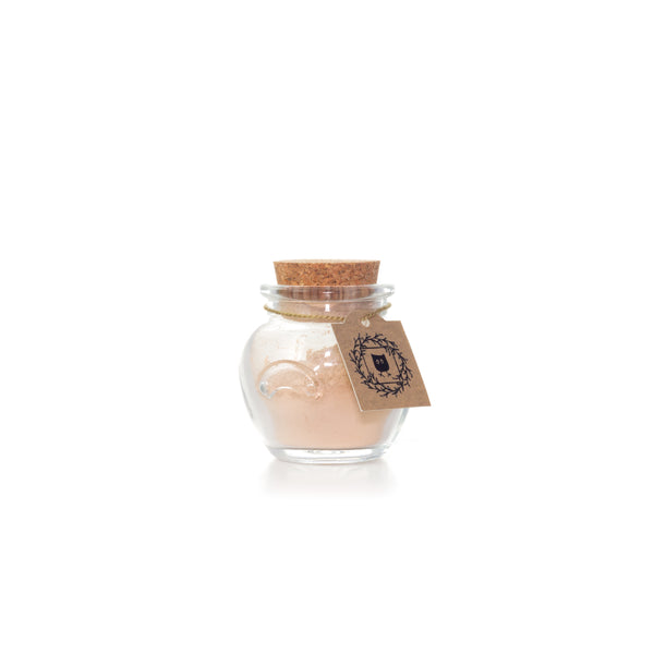 Featherlight Foundation Neutral Light shade glass jar with cork and hang tag